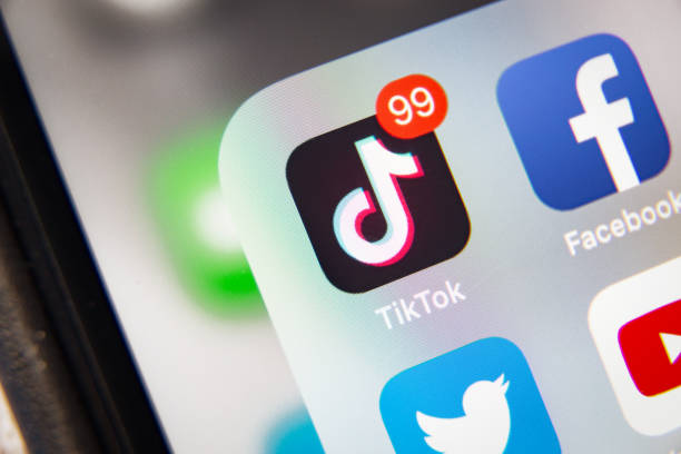 tiktok Tyumen, Russia - January 21, 2020: TikTok and Facebook application on screen Apple iPhone XR